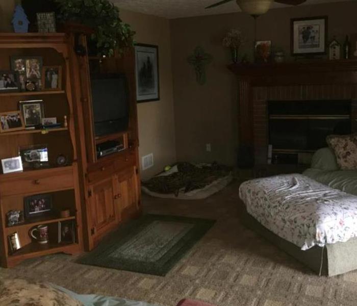 Photo of a living room with soot all over